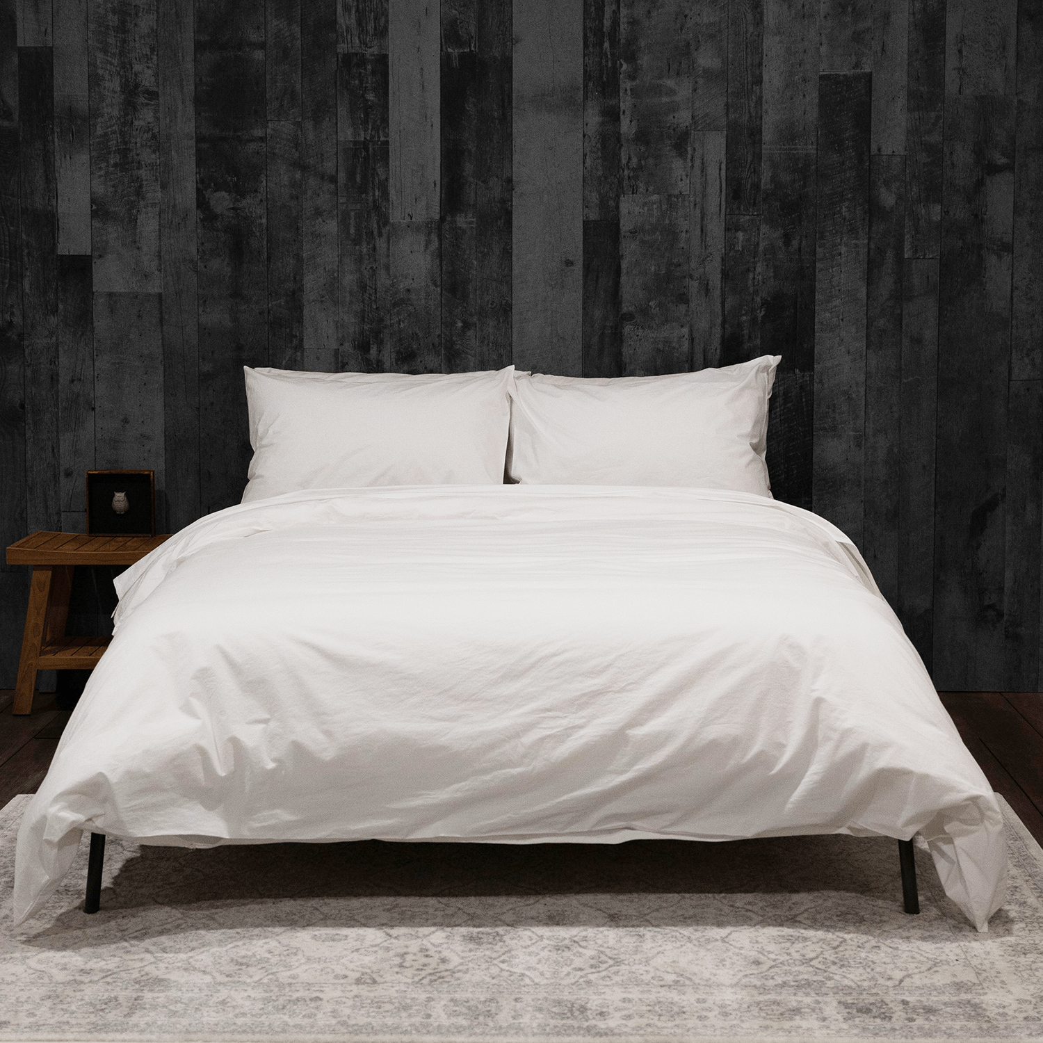 bed featuring white washed percale duvet set