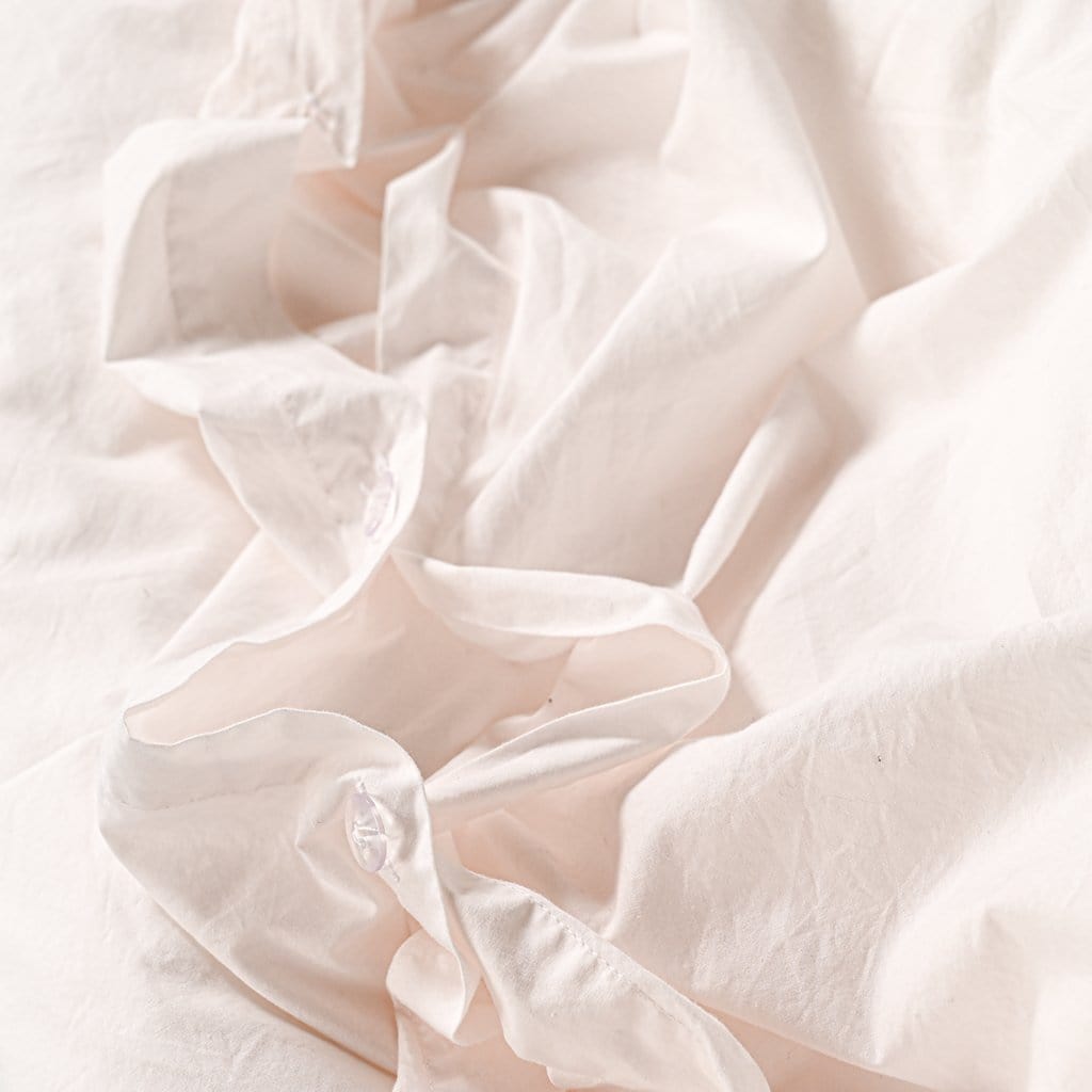 Close up of white percale duvet set