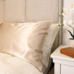White and Latte pillows on a bed  | Skylark+Owl Linen Co.