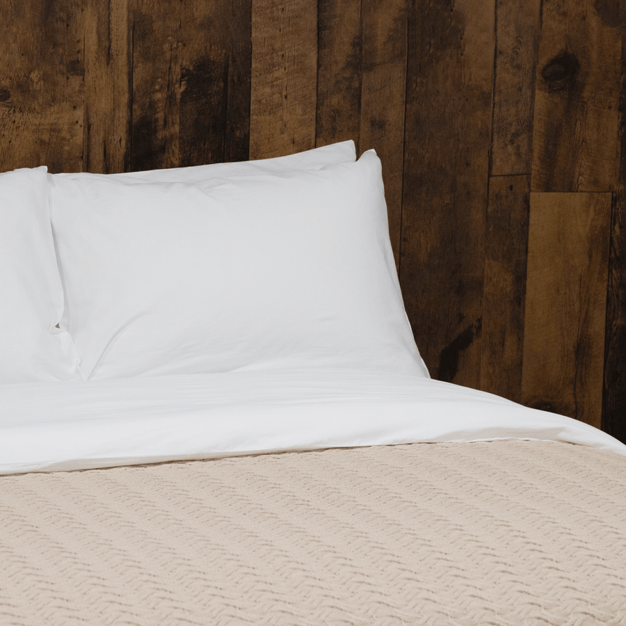 close up of pillows featuring white washed sateen sheet set