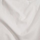 Close up of white washed sateen pillow cases