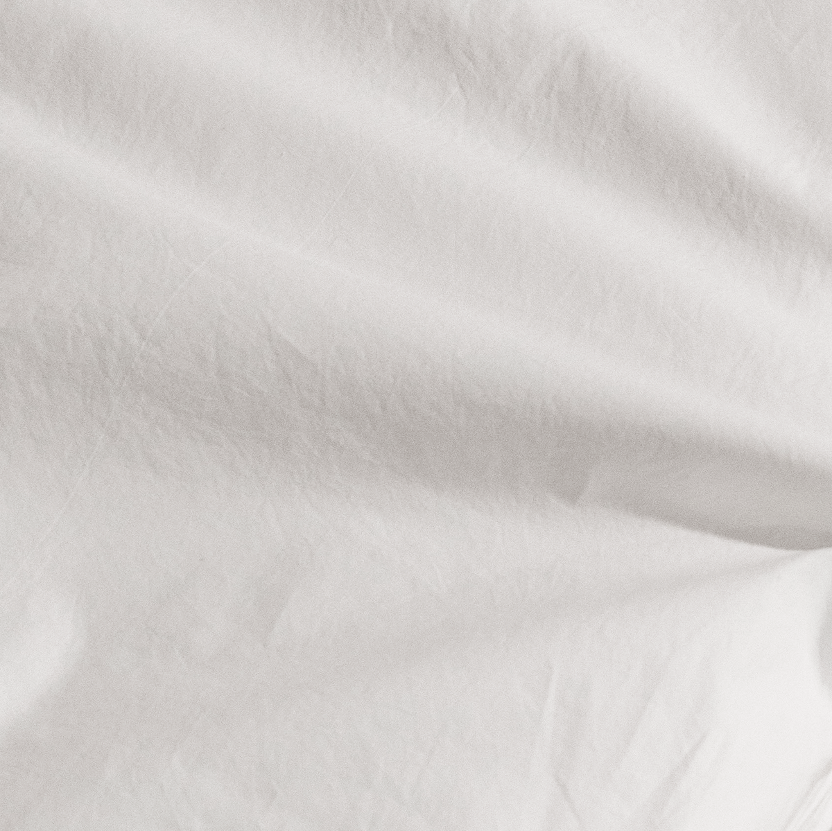 Close up of white percale duvet cover