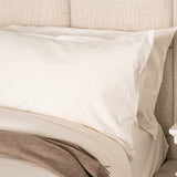 Pillows on bed featuring Chalk Organic Flannel PIllowcase
