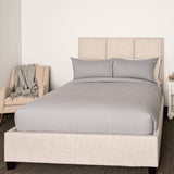 Bed Featuring Pewter Organic Duvet SET with Chalk Organic Flannel Sheet set