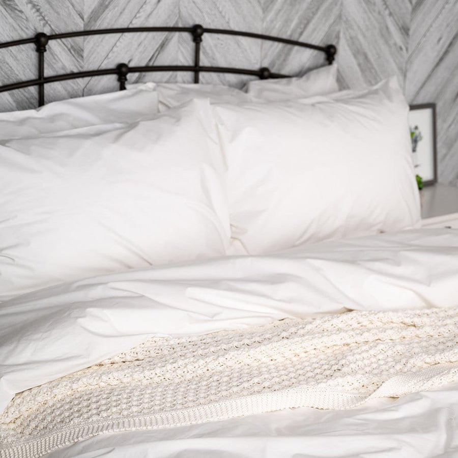 Bed Featuring White Percale Sheet Set