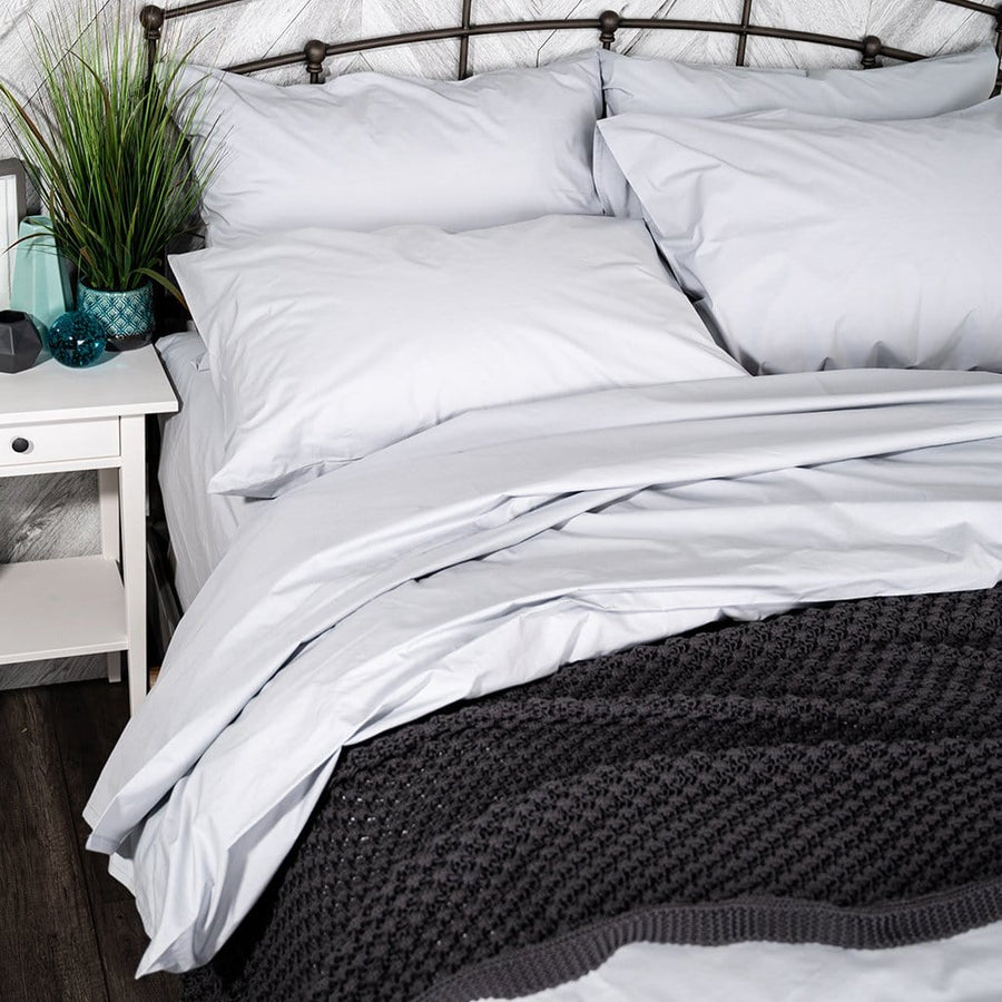 Bed Featuring Charcoal Popcorn Knit Blanket