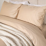 Bed featuring Frosted Almond Refined Sateen Duvet Cover Set 