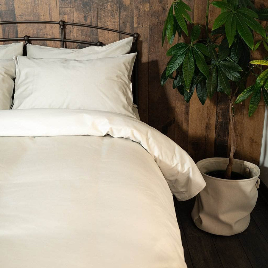 Bed featuring Refined Sateen Duvet Cover 