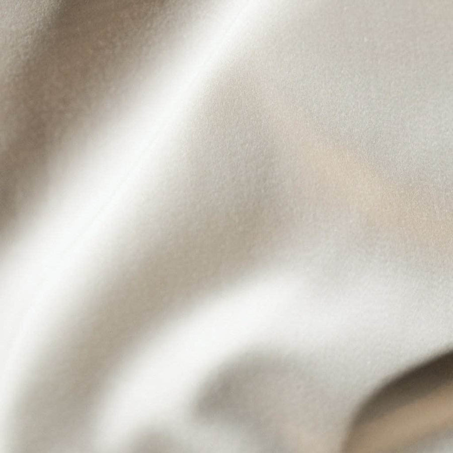 Close up of refined sateen Duvet cover in sand