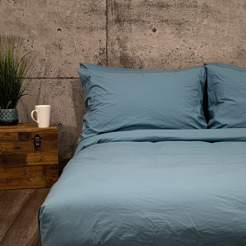 Bed featuring Baltic sea washed percale sheet set