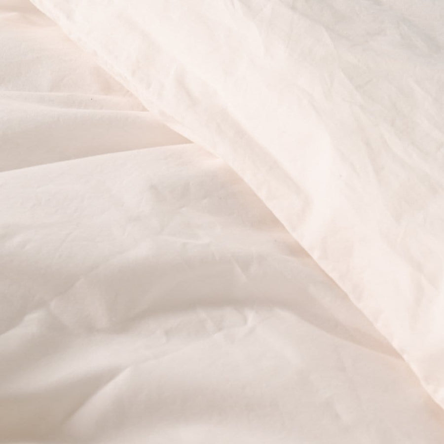 Close up of white washed percale pillowcase