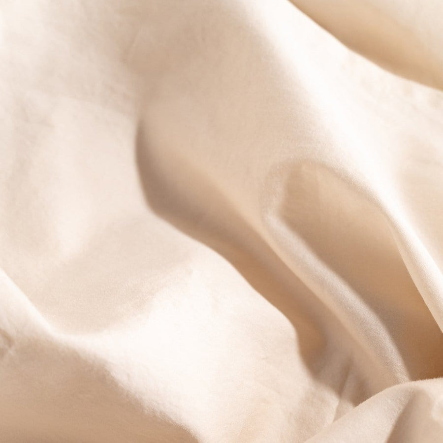 Close up of chalk washed sateen duvet cover