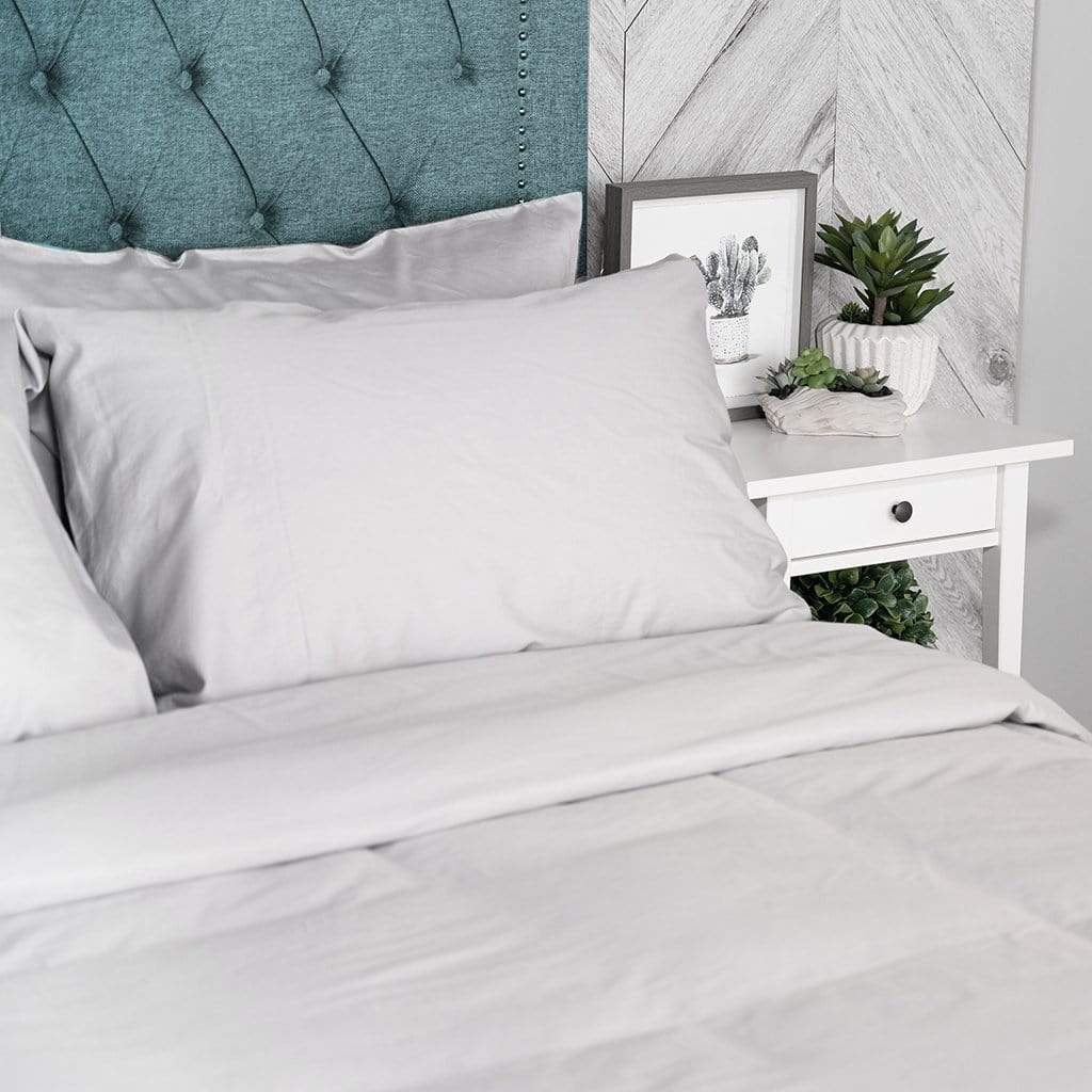 bed featuring white washed sateen duvet cover